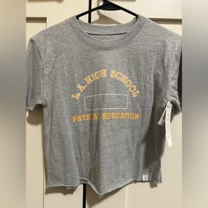 New with tag cropped tshirt. Size L youth. But fits a small and comfy XS